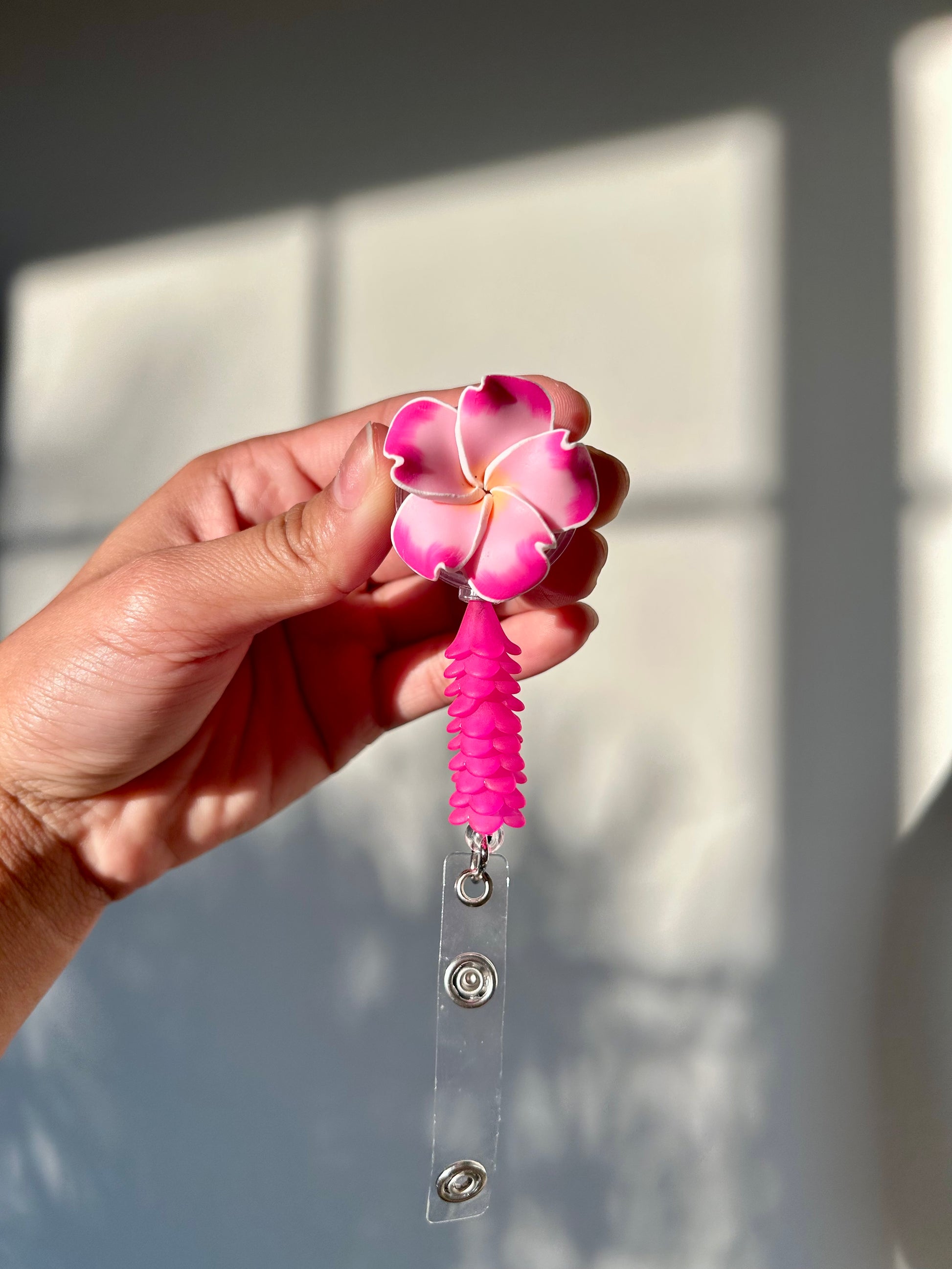 Pink/Lavender Mini Puakenikeni Lei Badge Reel