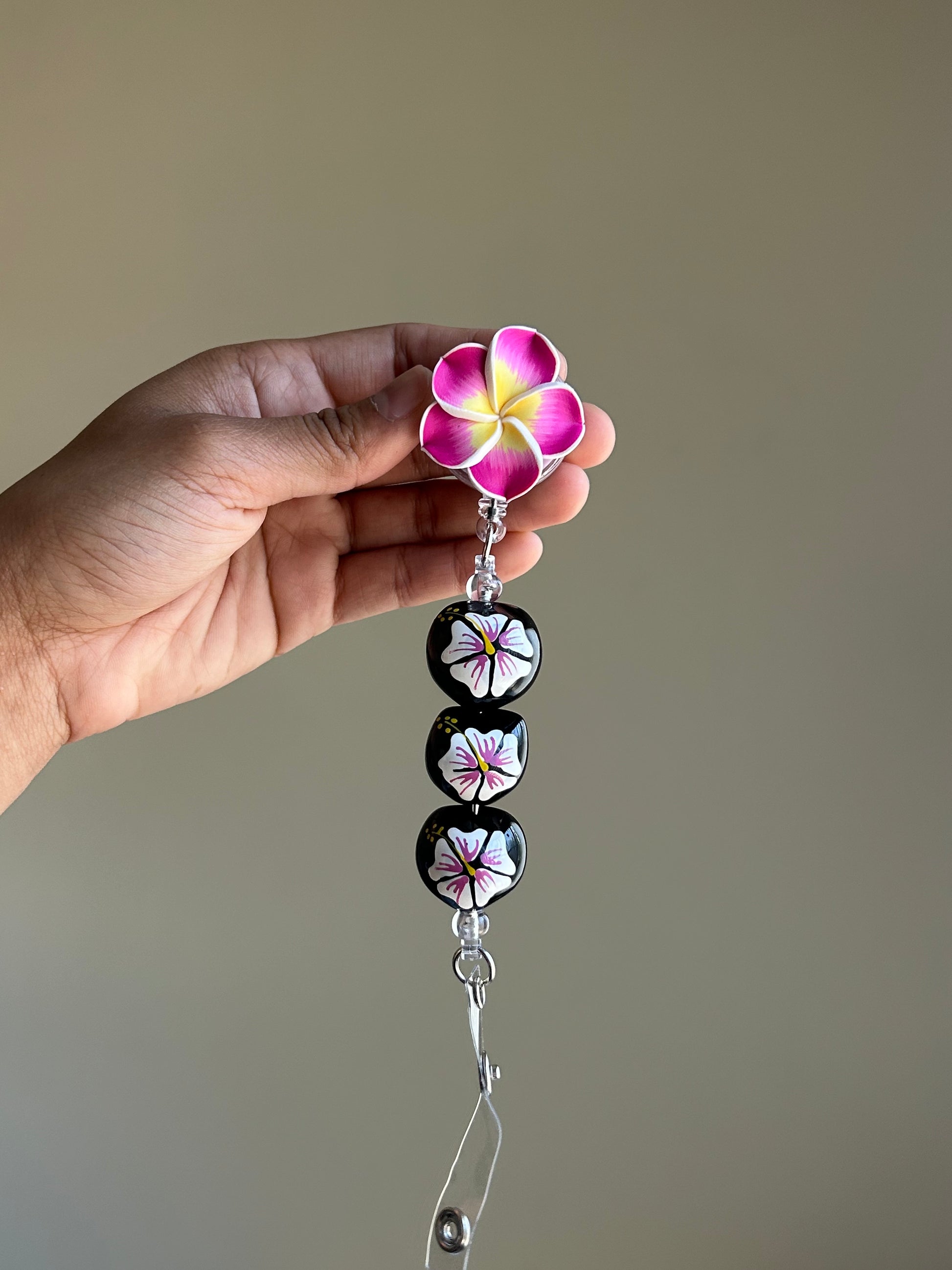 Plumeria kukui nut badge reel ID holder with retractable clip