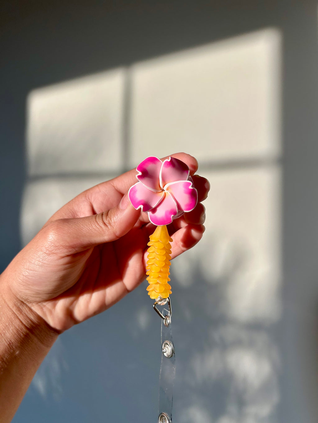 Pink/Lavender Mini Puakenikeni Lei Badge Reel