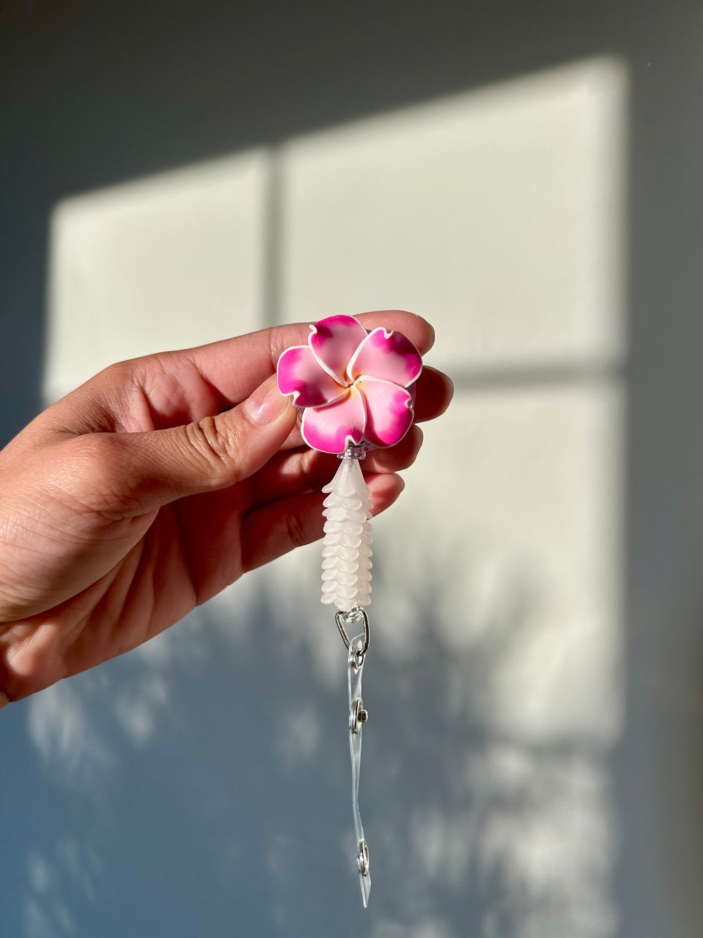 Pink/Lavender Mini Puakenikeni Lei Badge Reel