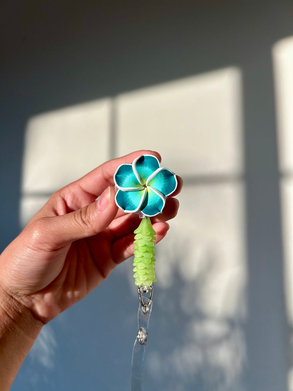 Teal Mini Puakenikeni Lei Badge Reel