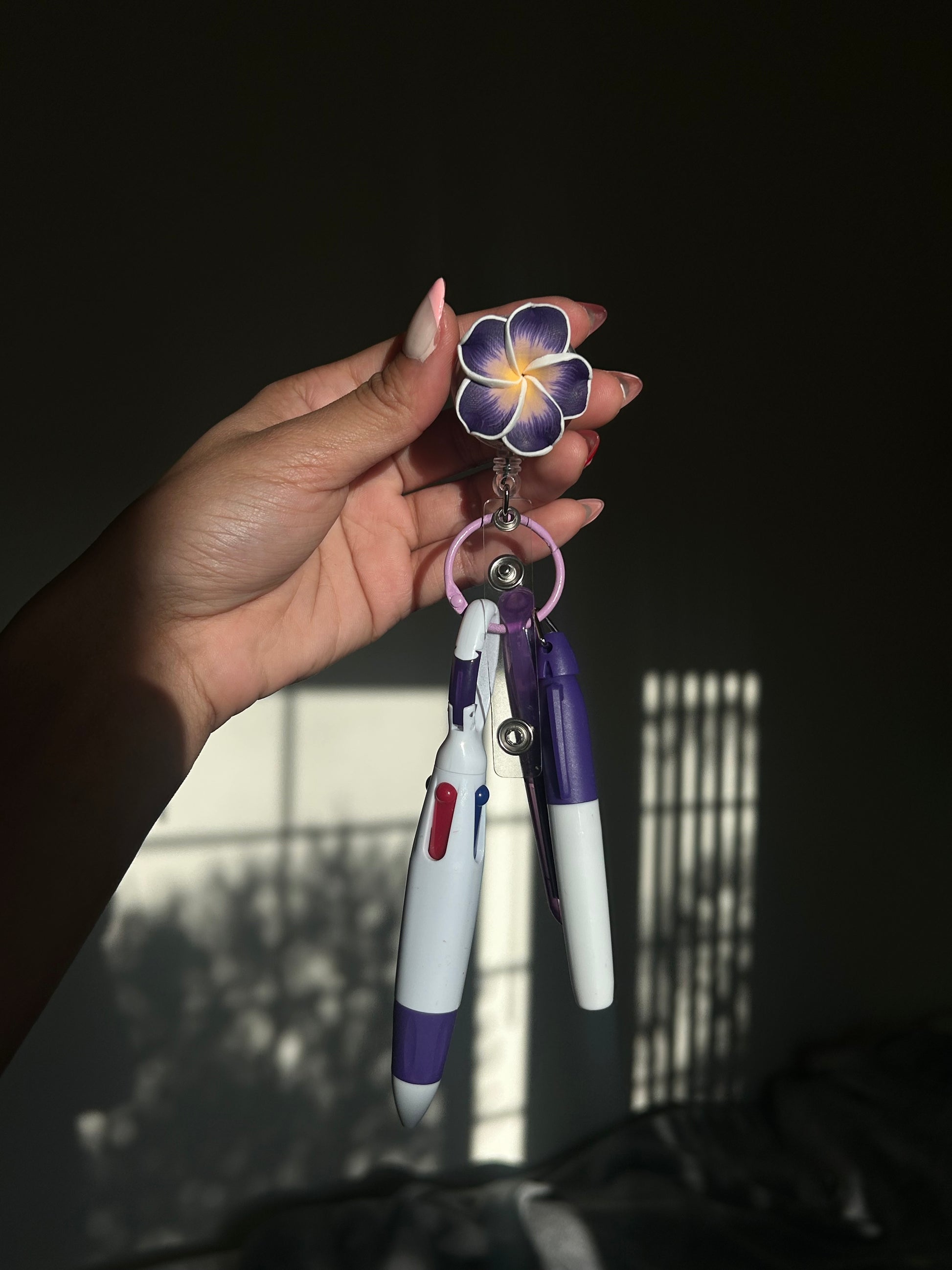 Purple Plumeria Badge Reel Pen Set