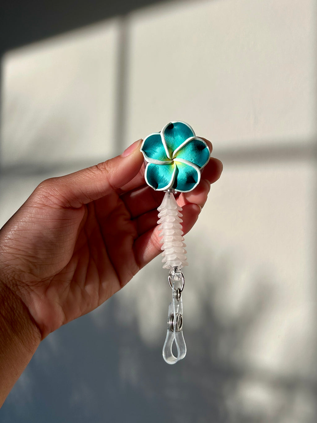 Teal Mini Puakenikeni Lei Badge Reel