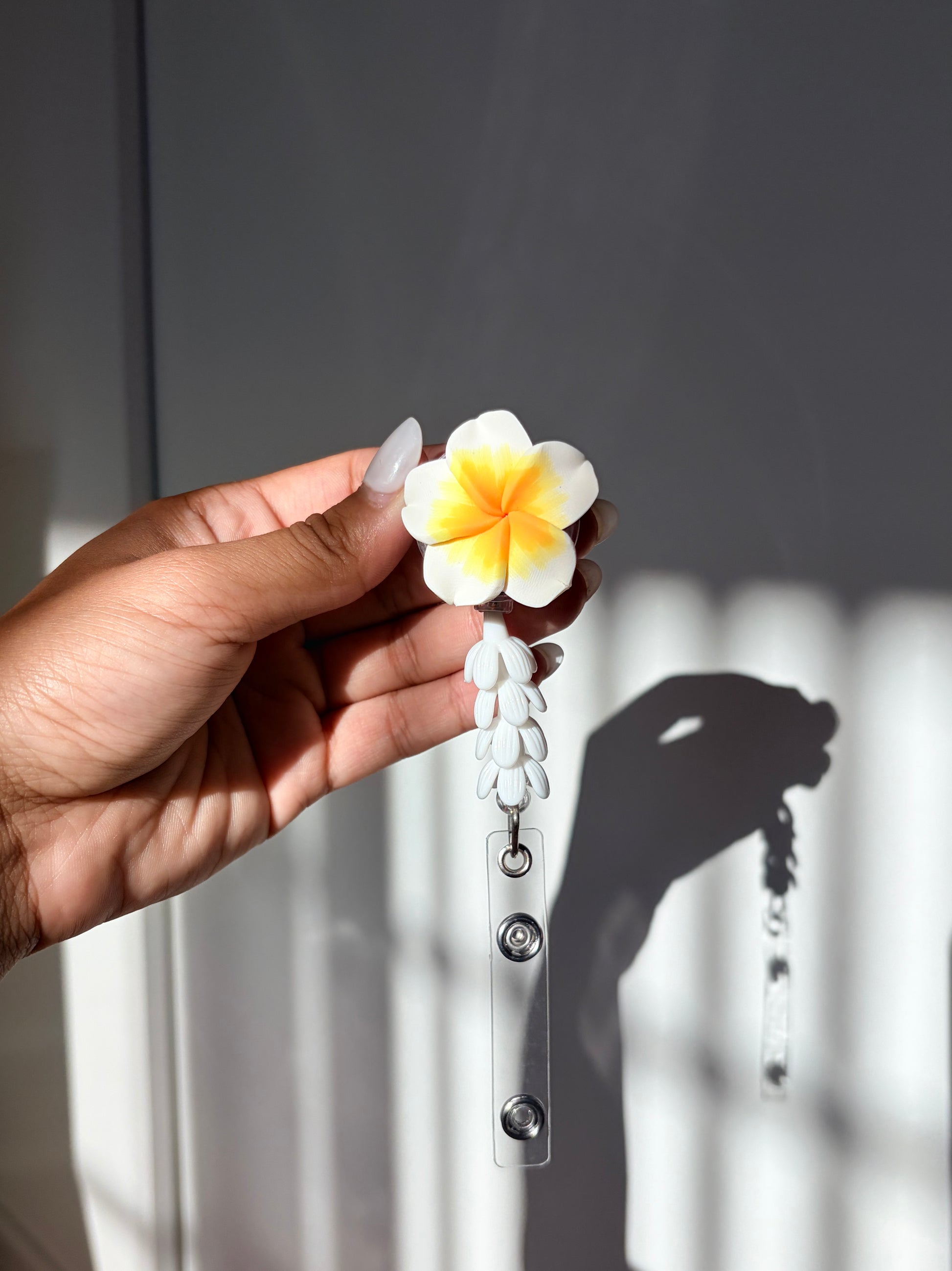 Yellow Plumeria Mini Pikake Badge Reel