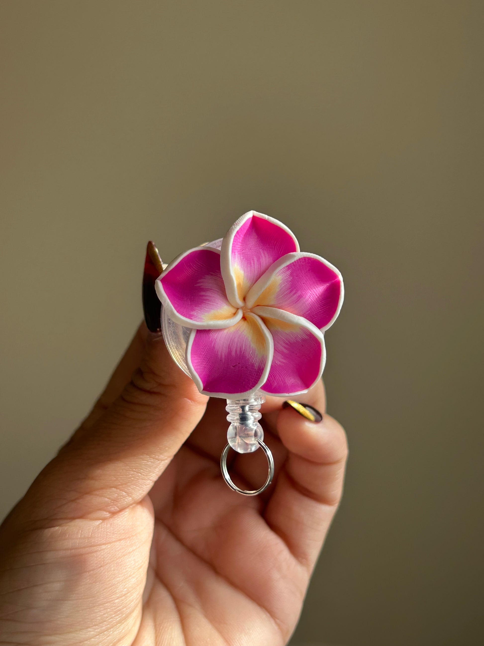 Plumeria Badge Reel Lei - Purple
