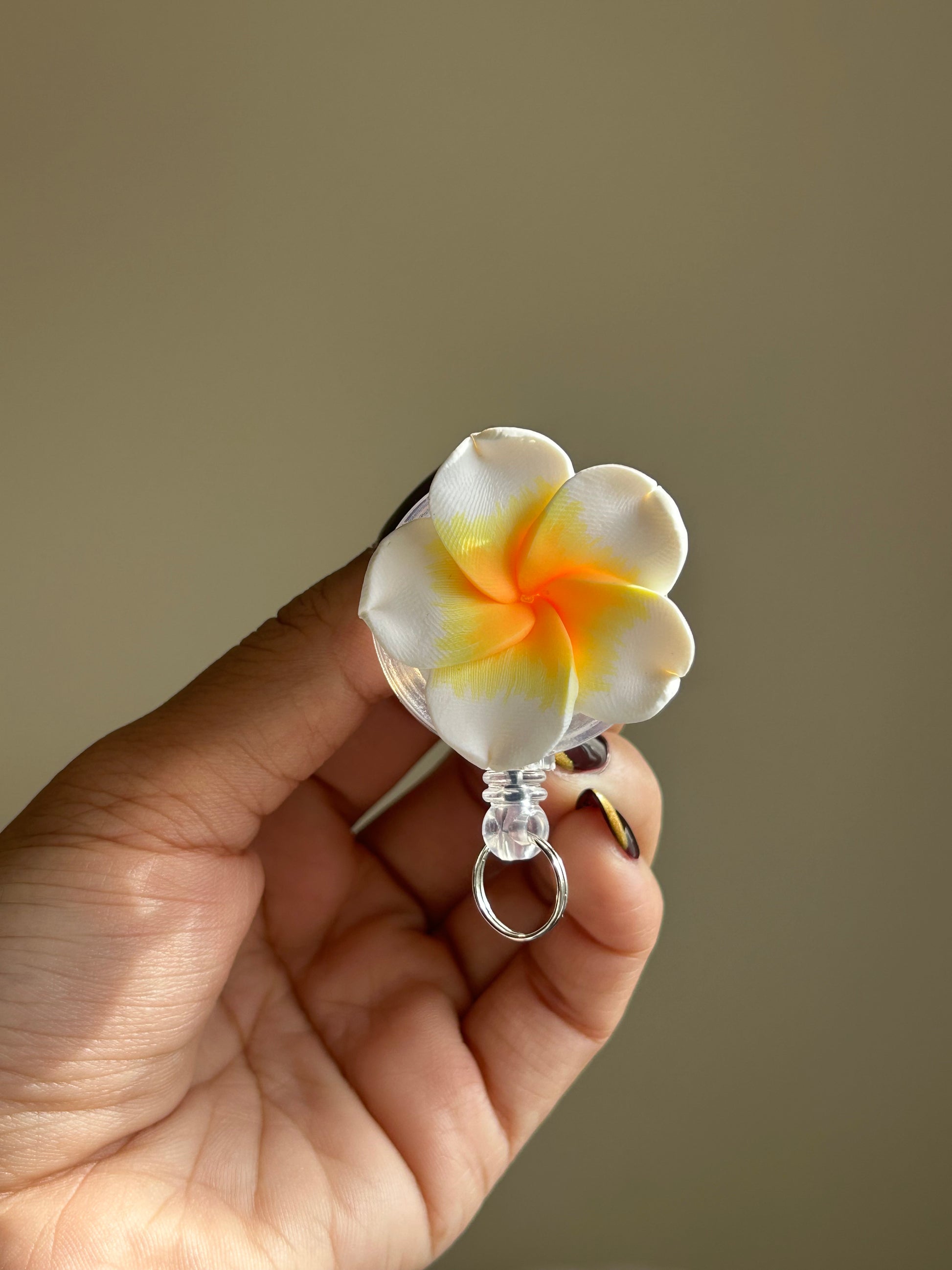 Plumeria Badge Reel Lei - White + Yellow