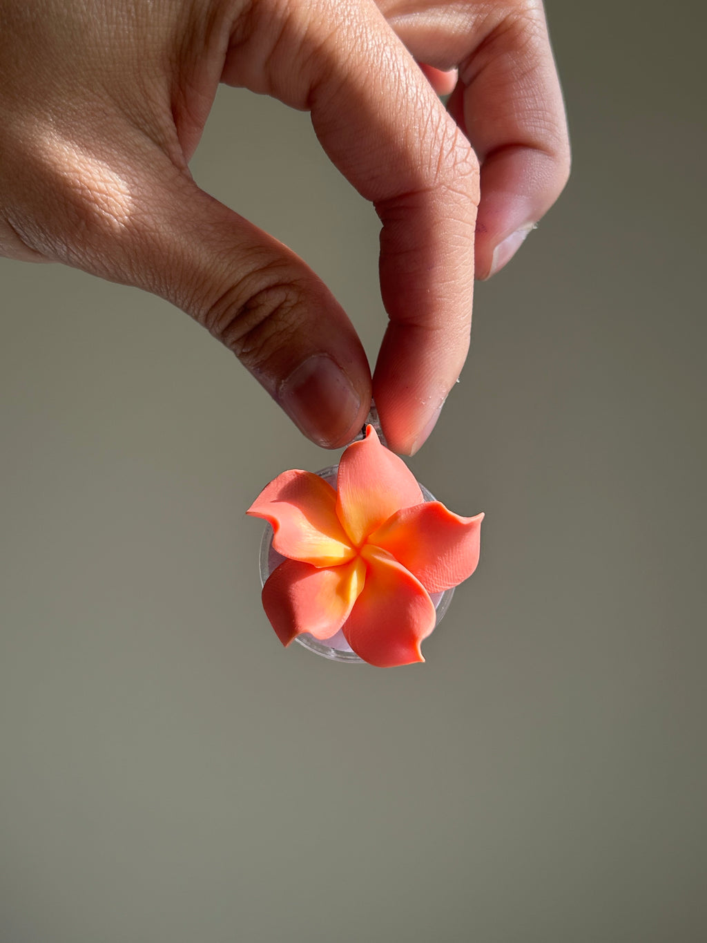 Plumeria Badge Reel Lei - Coral