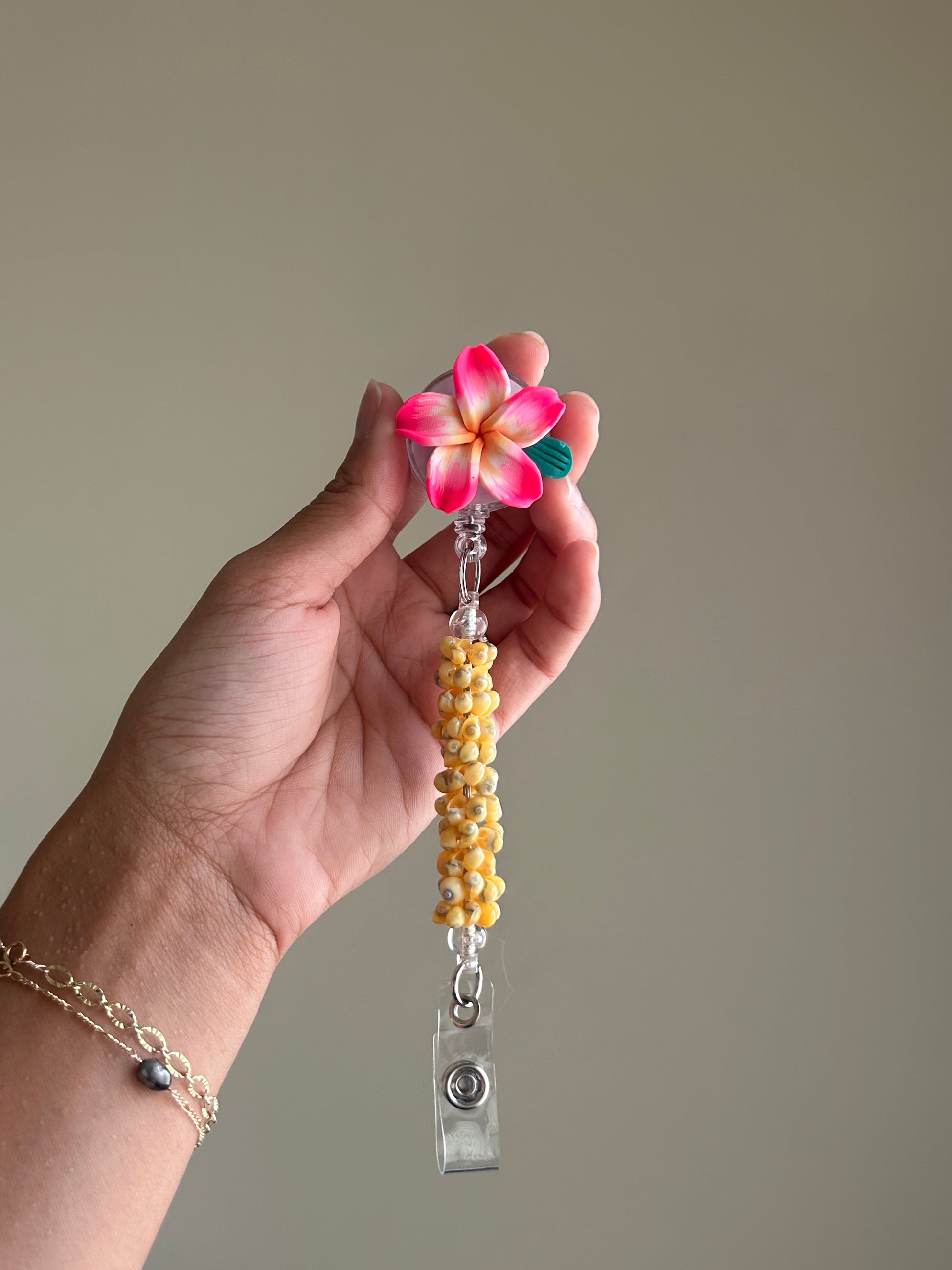Tiare Badge Reel - Pink