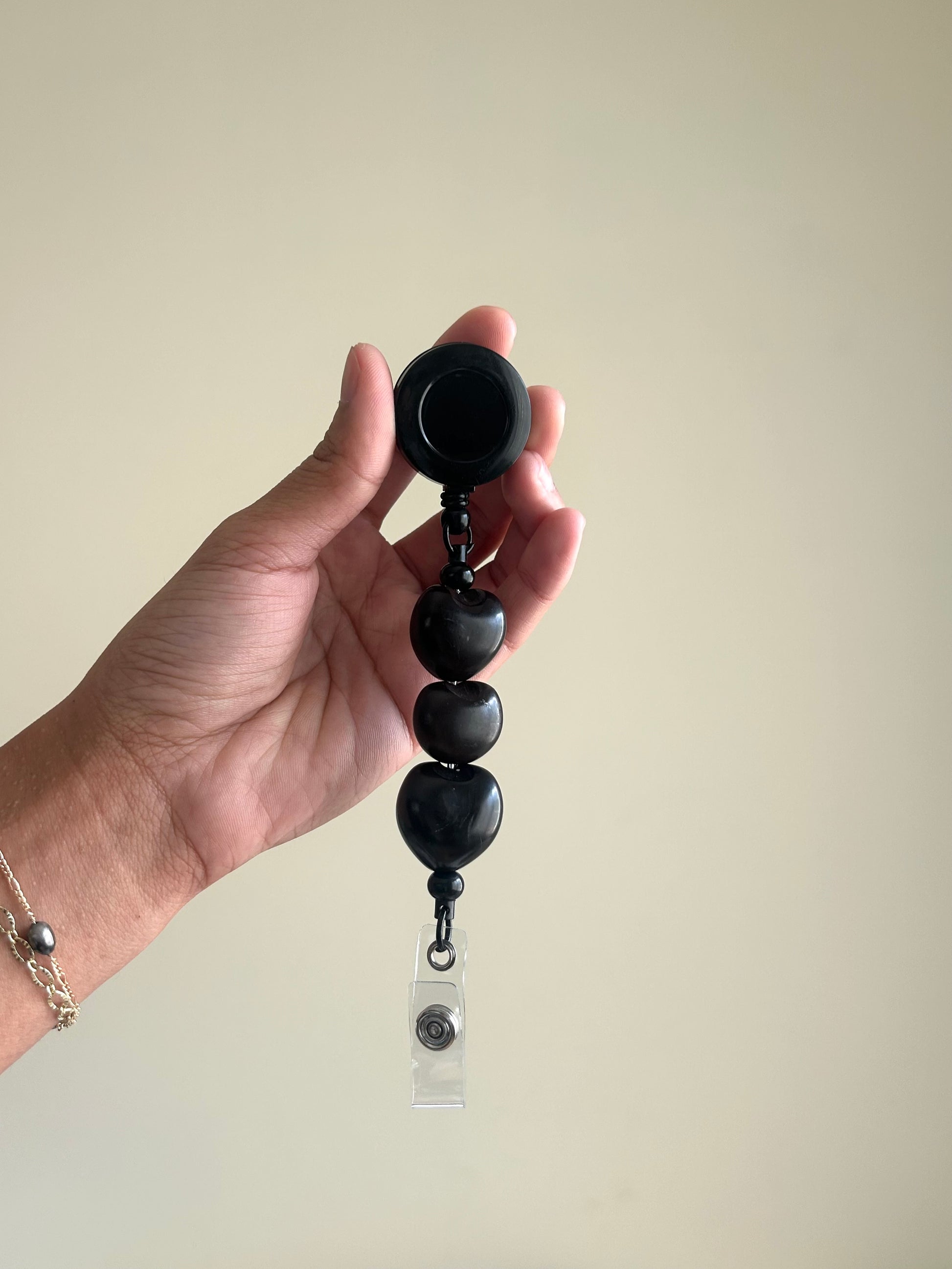 Black kukui nut retractable badge reel