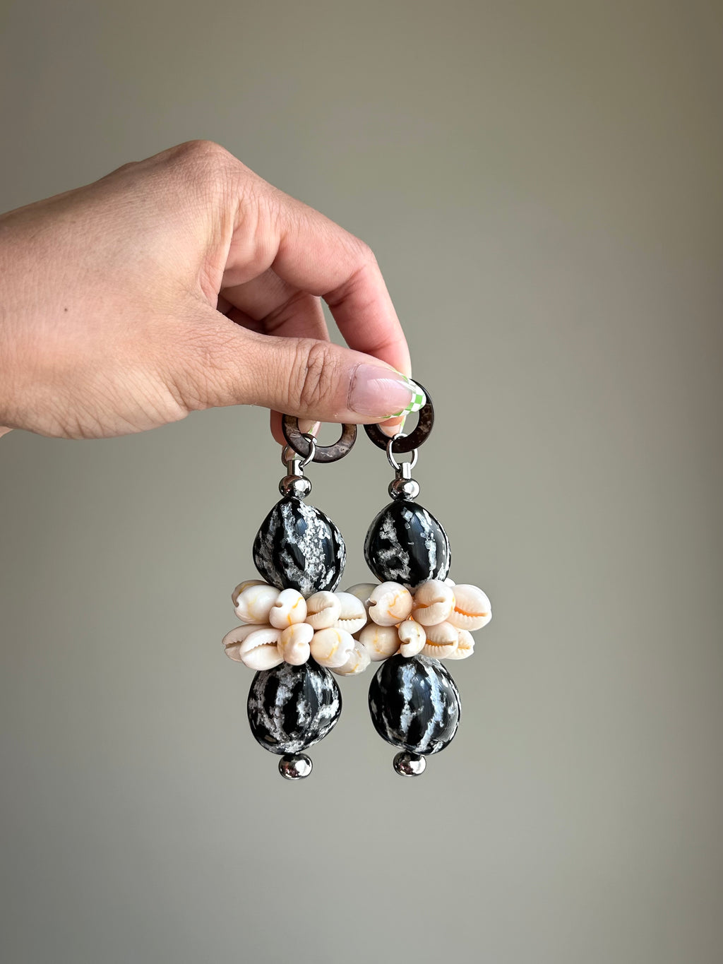 kukui nut keychain with cowrie shells