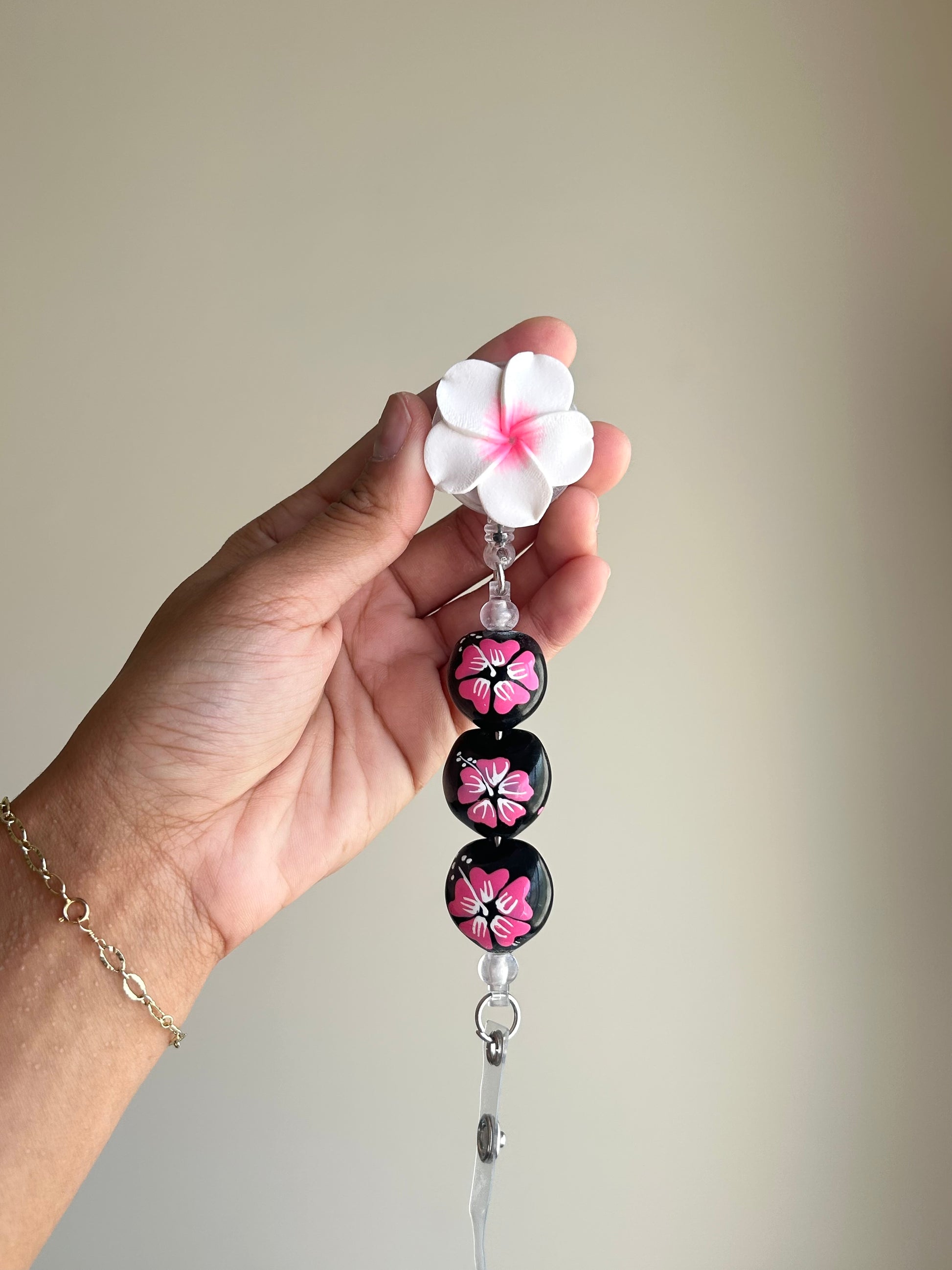 Pink Plumeria/Kukui Nut Badge Reel Lei