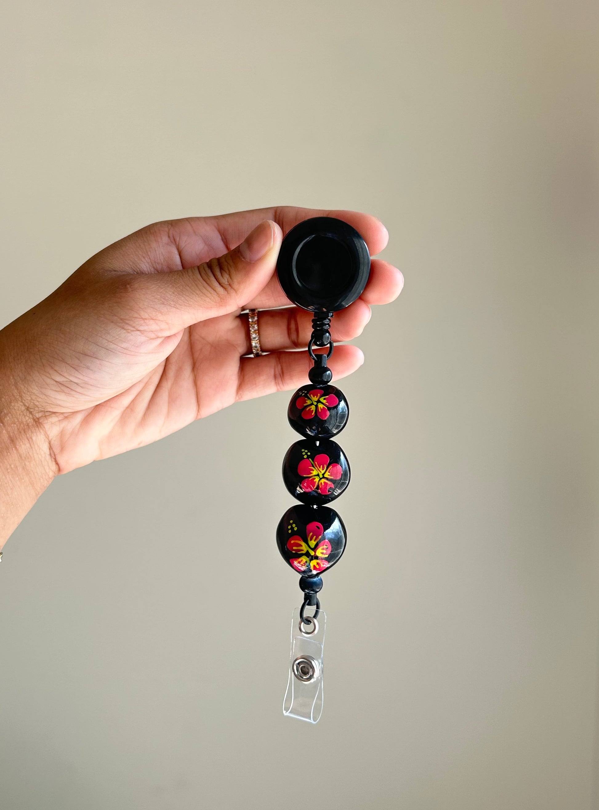 Hibiscus kukui nut badge reel with retractable ID holder
