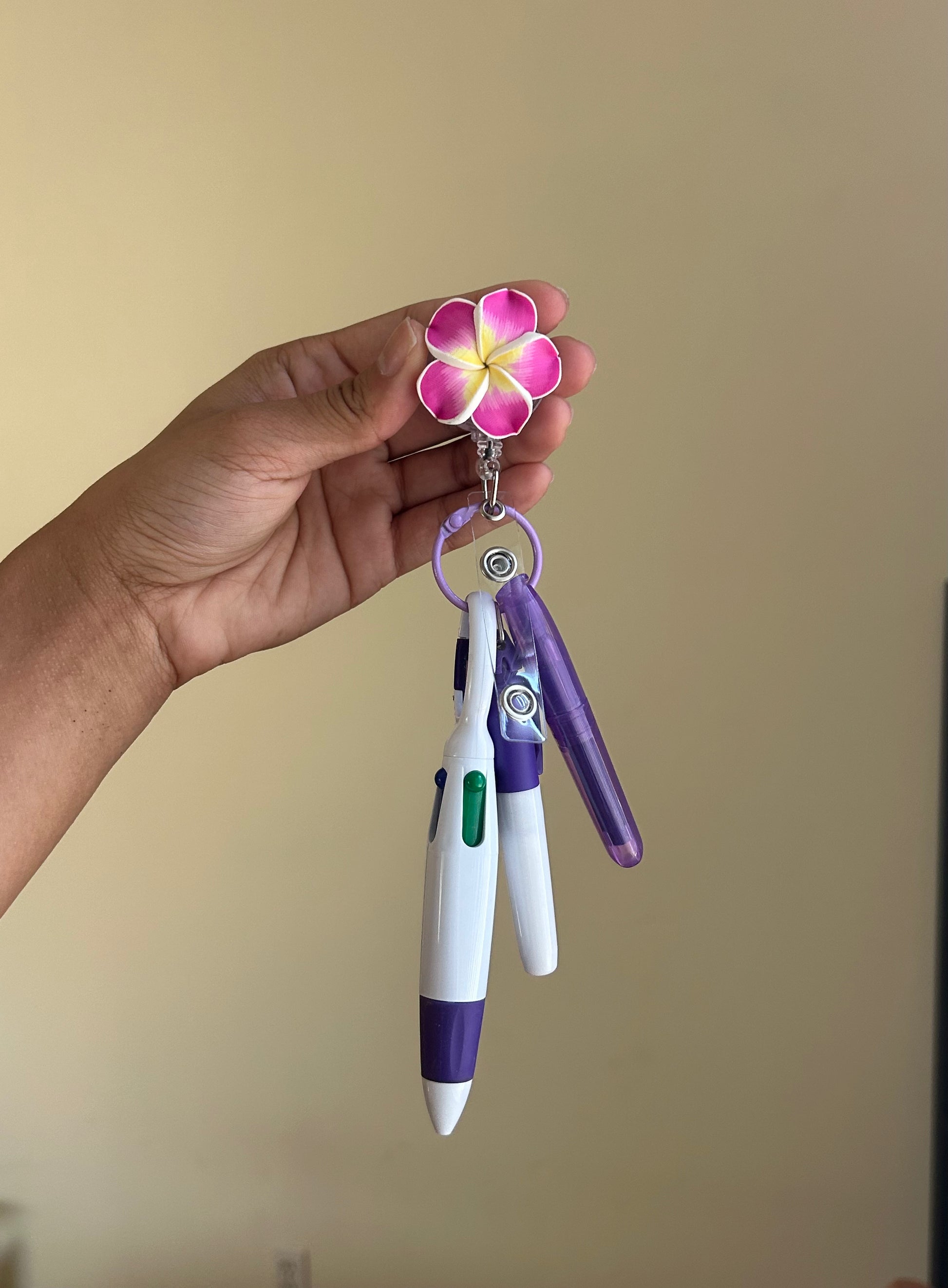 Purple Plumeria Badge Reel Pen Set